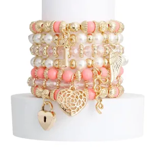 Elegant 7 Piece Gold Tone Beaded Bracelet Set - Perfect for Adding Charm to Your Outfit!