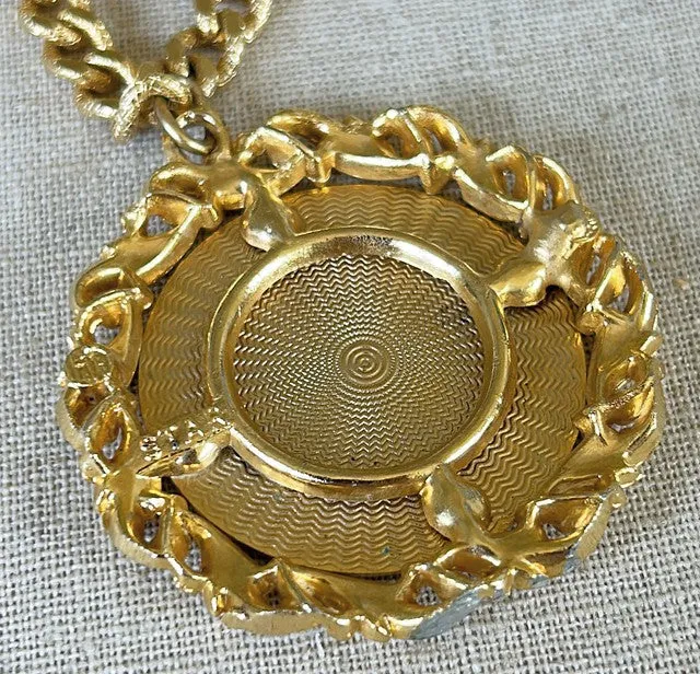 Fabulous 60s large scale coin pendant gold metal necklace.