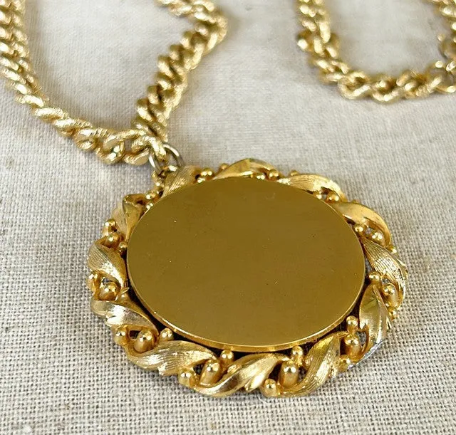 Fabulous 60s large scale coin pendant gold metal necklace.
