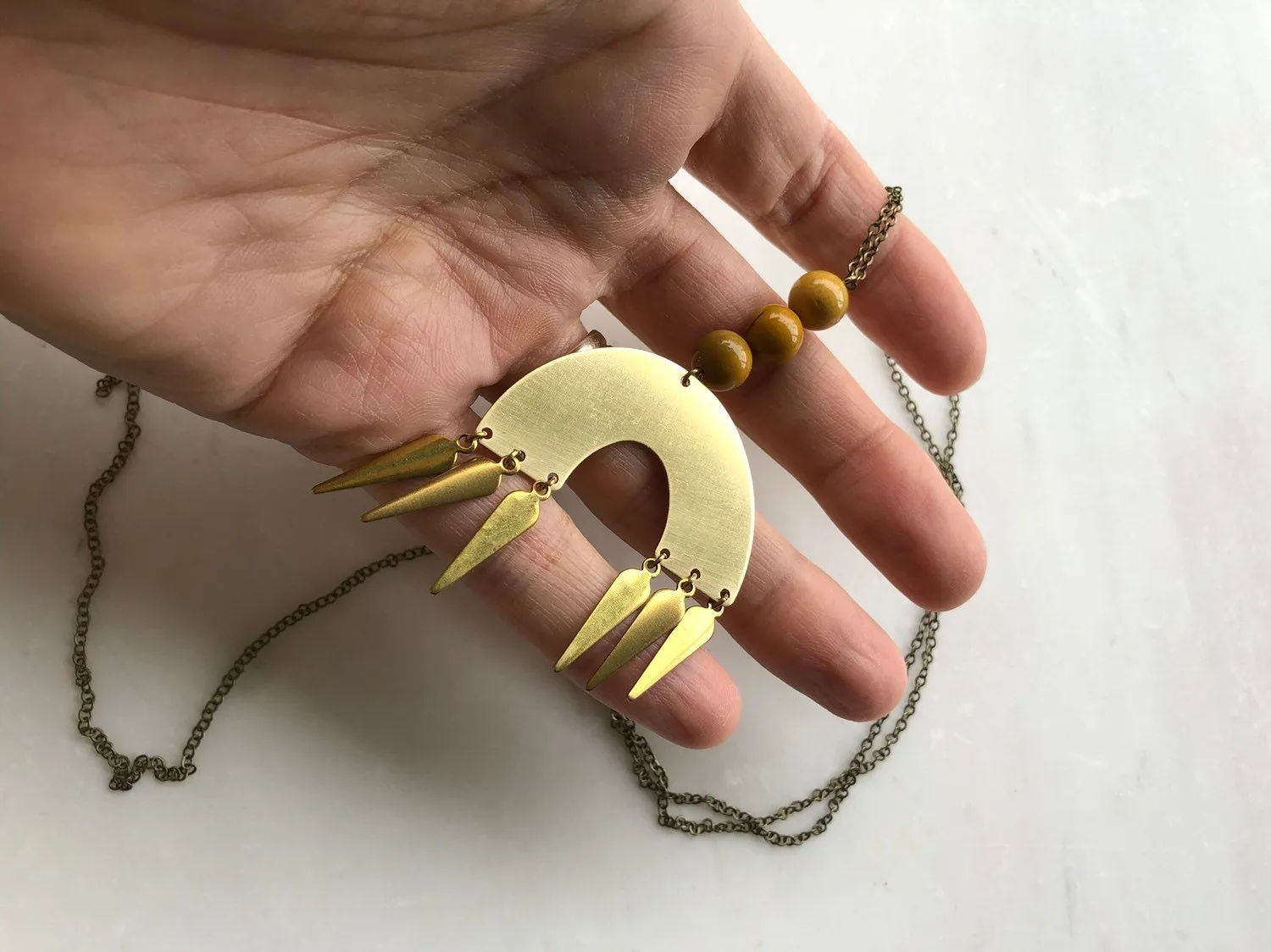 Orange Beaded Crescent Necklace